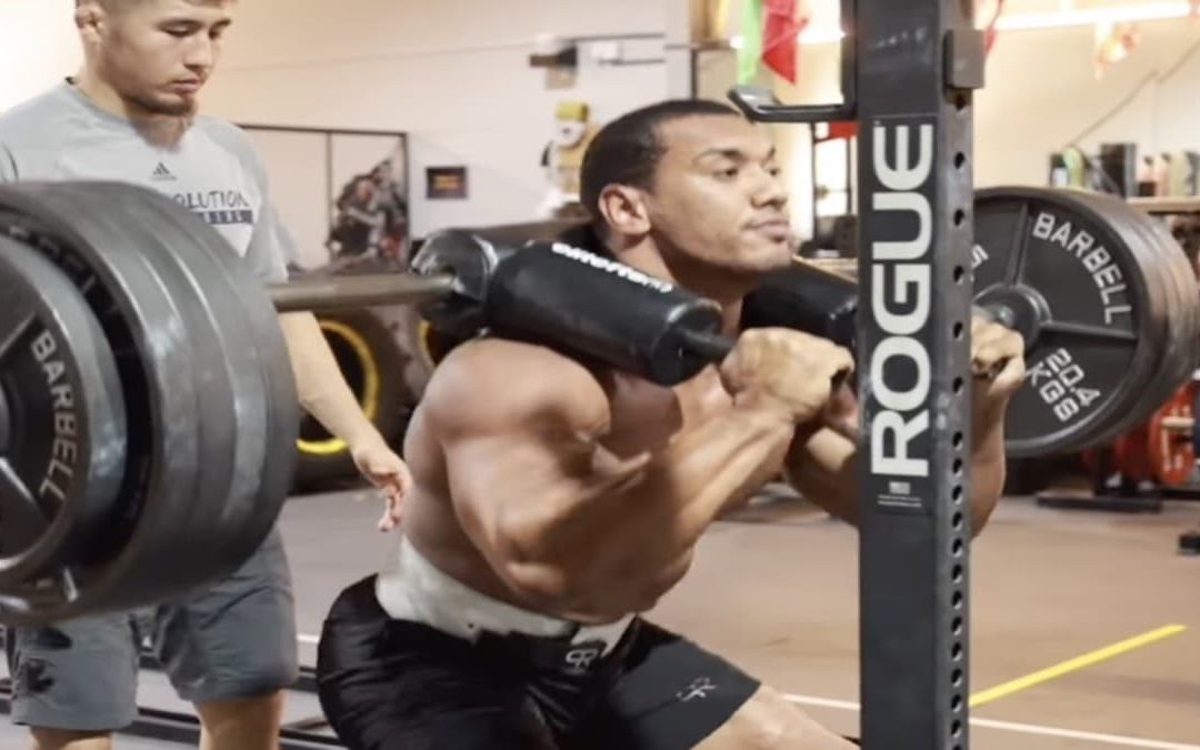 Larry Wheels Squats 495 Pounds For 15 Reps