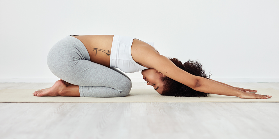 6 Stress-Reducing Yoga Poses to Get You Through the Holidays